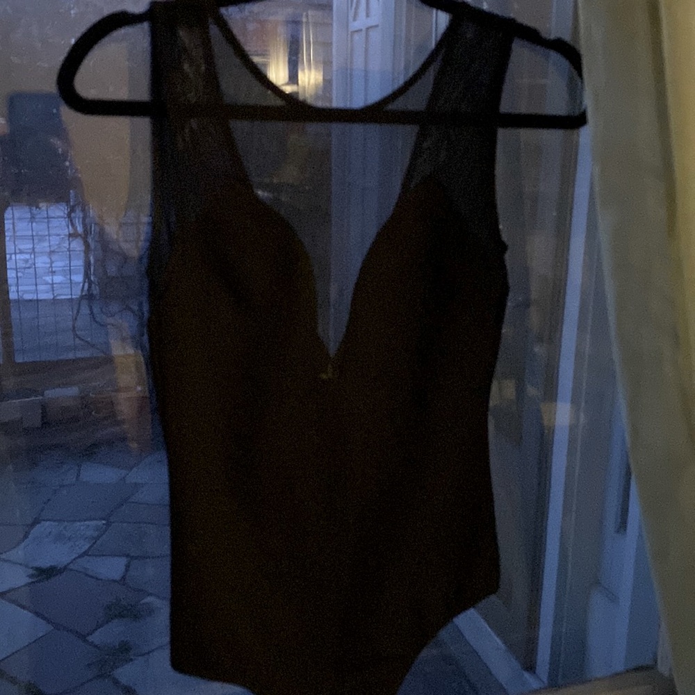 Size small black illusion neckline bodysuit from Lulu’s
